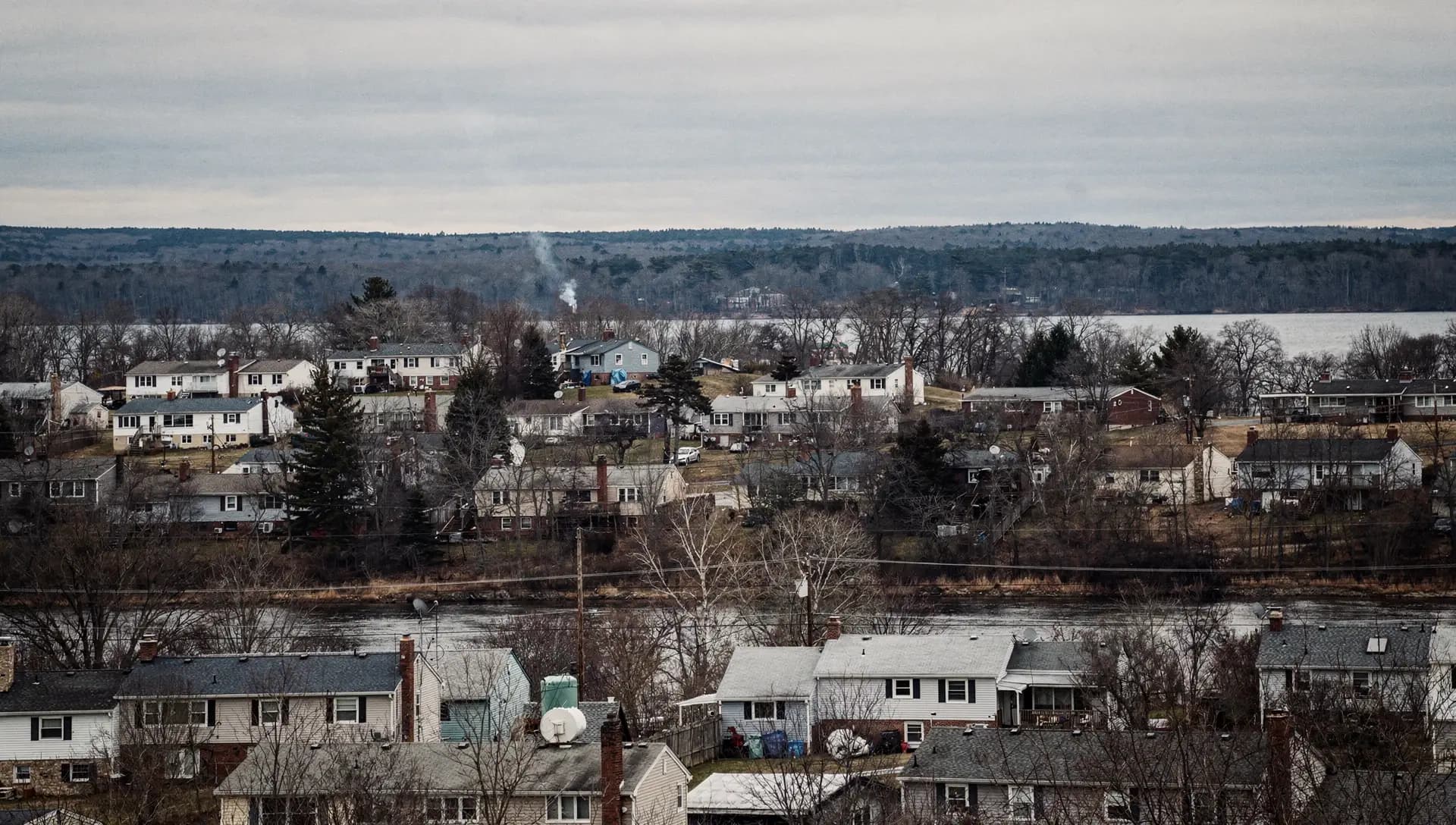 A residential street in Hudson, NH in winter.